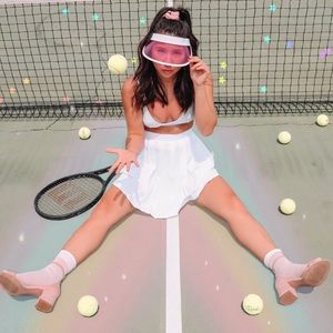 White pleated tennis or school girl mini skirt